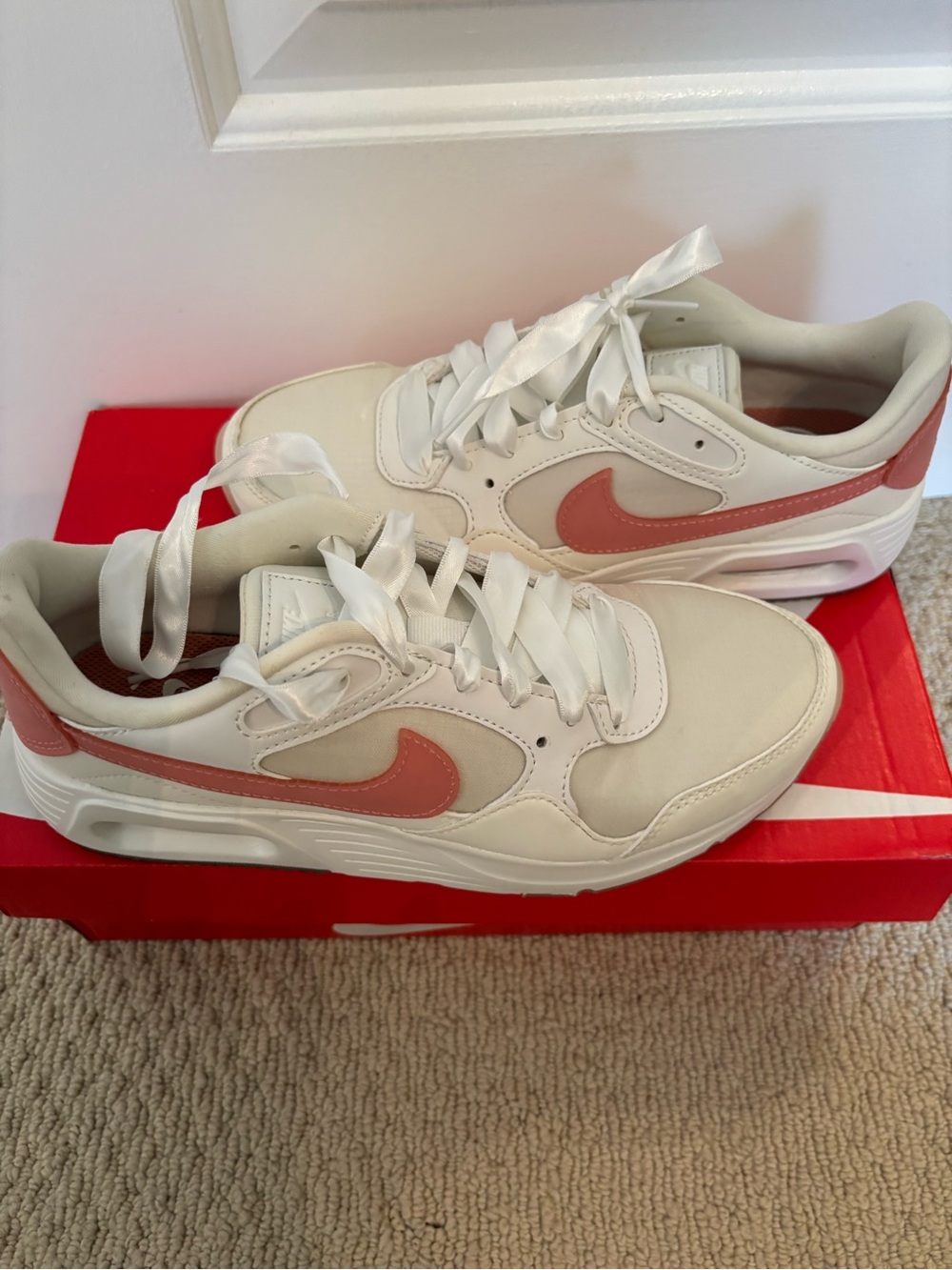 Nike White Sneakers with Coral Pink Swoosh